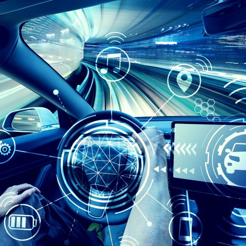 Person driving a new electric vehicle from inside